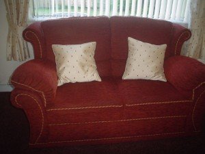 Terracotta 3 piece suite and pouffe.