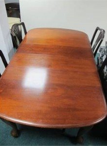 A five piece Mahogany dining suite