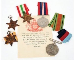 A World War II group of five medals: 1939-45 War Medal, Defence Medal, Africa Star, Italy Star and 1939-45 Star in official card box.