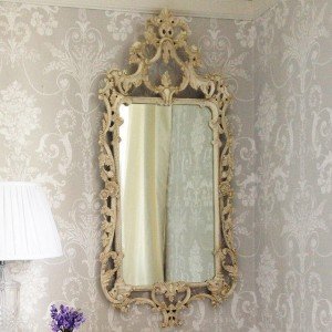 carved wall mirror