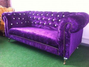 velvet upholstered Chesterfield sofa