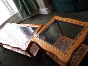 two glass and wood tables,