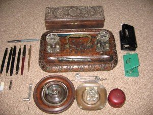 A collection of antique inkwells