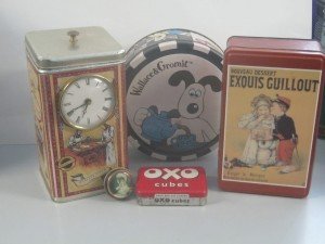 five vintage tins