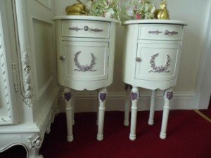 circular carved bedside tables