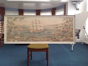 tapestry in a white frame