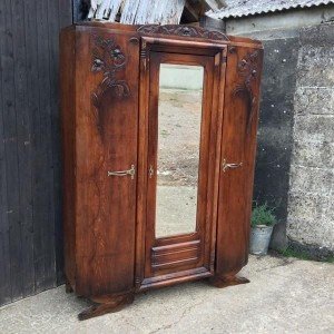 carved triple wardrobe