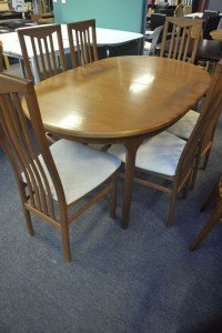 oval solid wood dining table