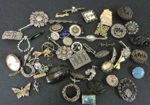 collection of assorted brooches