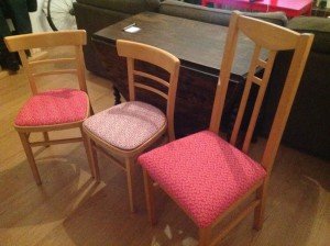 three dining table chairs