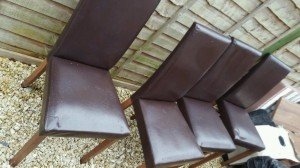 four matching dining chairs